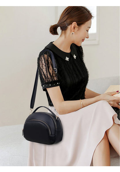 Проста и многофункционална дамска чанта през рамо