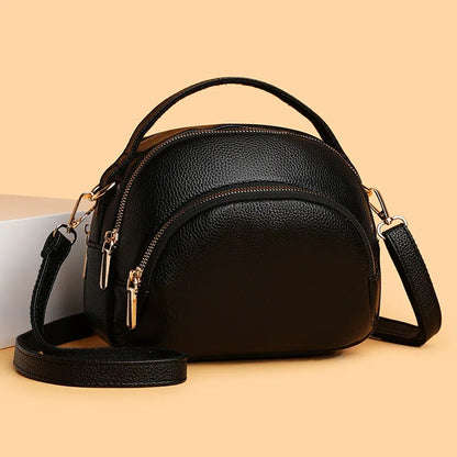 Проста и многофункционална дамска чанта през рамо