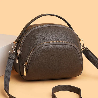 Проста и многофункционална дамска чанта през рамо